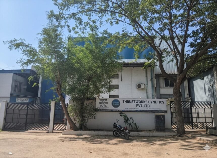 Thrustworks Dynetics facility exterior in Pune with the company signboard