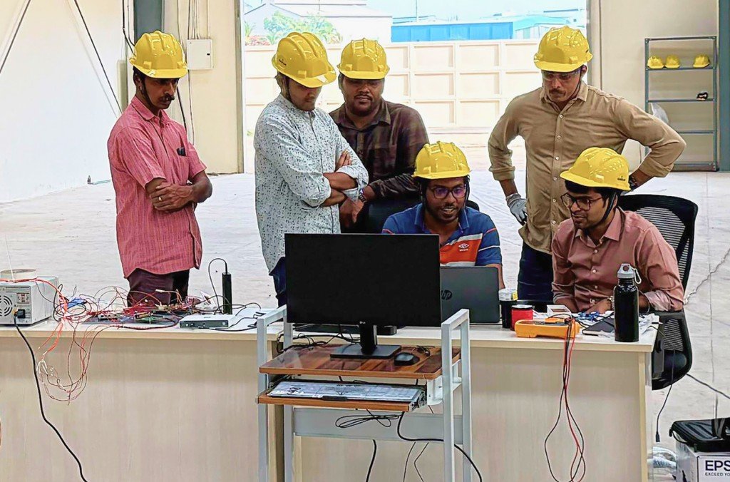 Alt text: Astrobase engineers with test instrumentation at the Anantapur facility