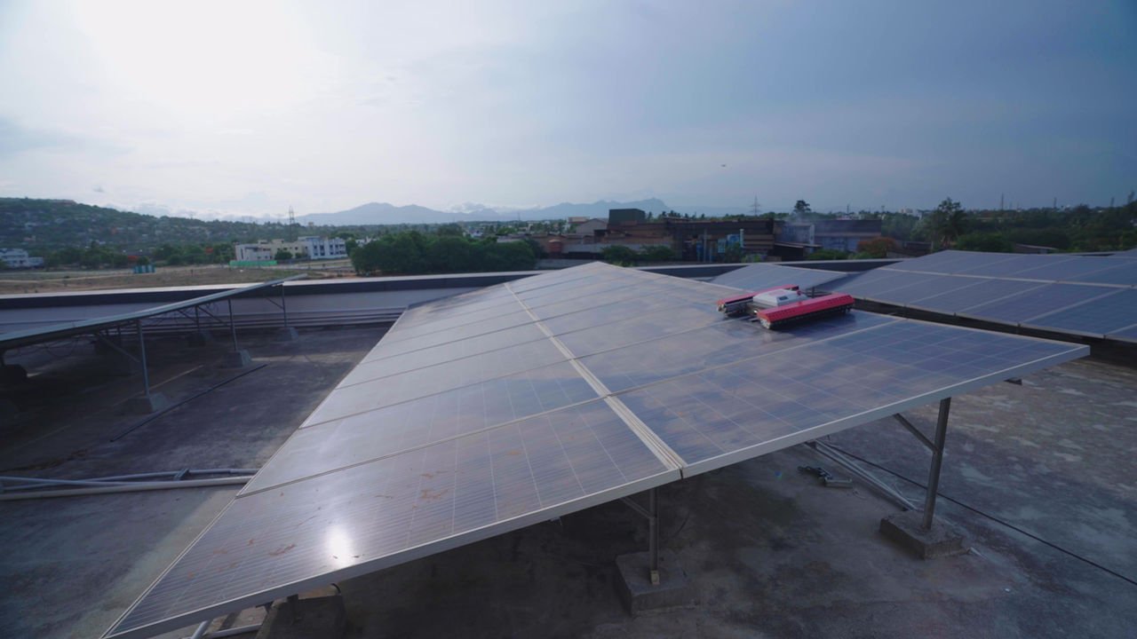 Alt text: Solavio Independent Bot portable robot for rooftop solar panel cleaning