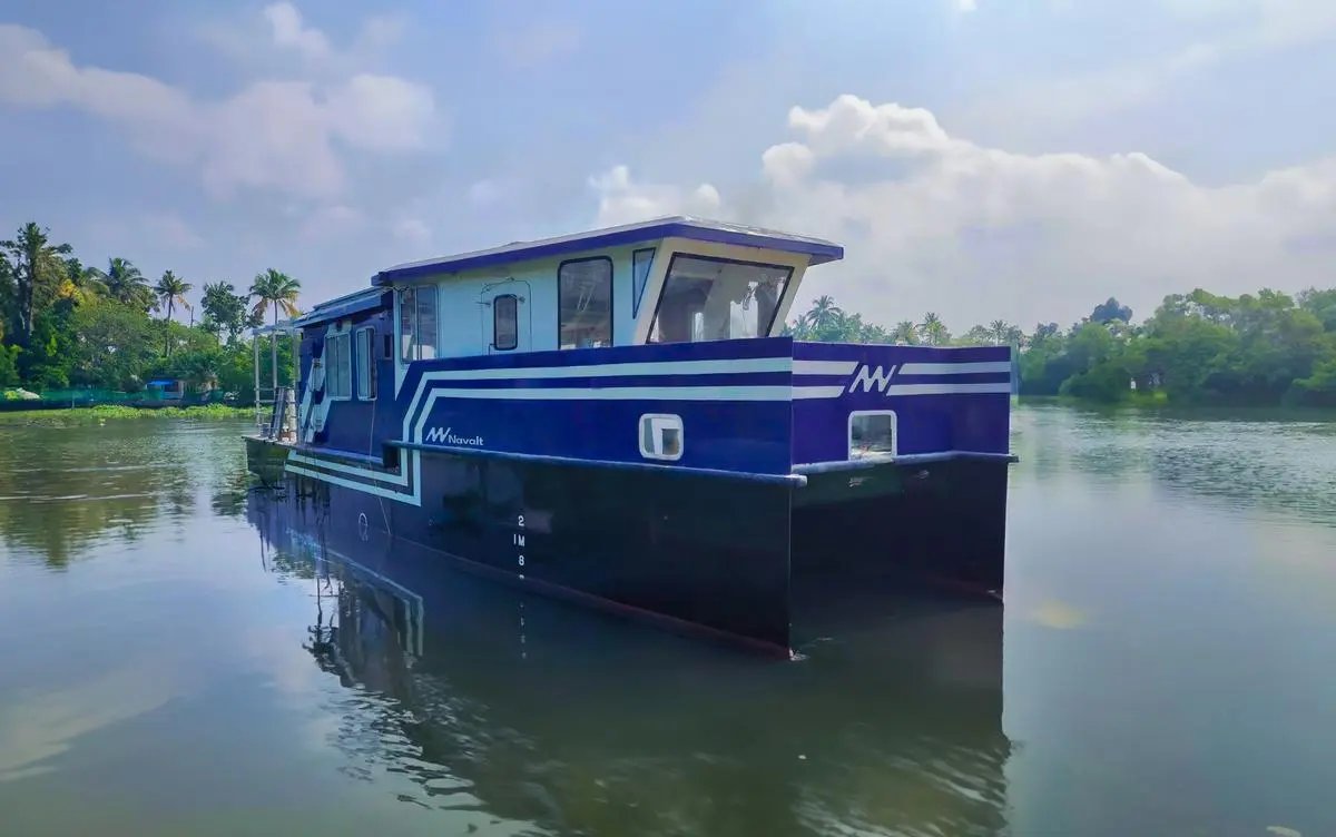 Alt text: Navalt Barracuda solar-electric boat at its Alappuzha launch