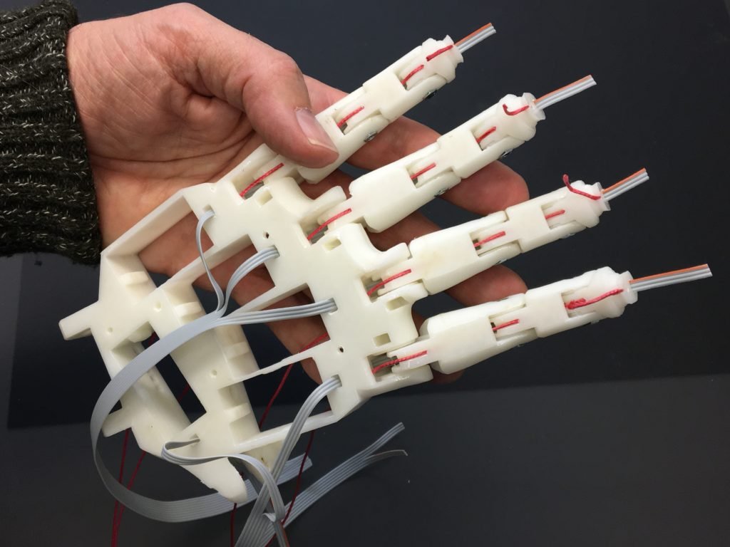 Alt text: DexteraX tendon-driven robot hand fingers mechanism