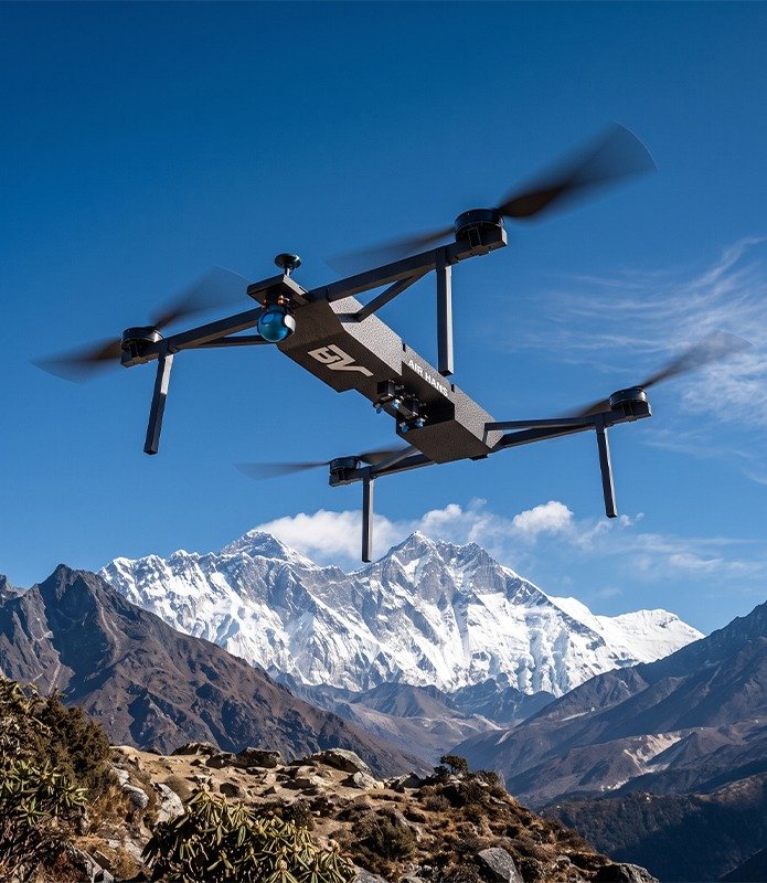 A BonV Aero drone flying over snow-covered Himalayan peaks