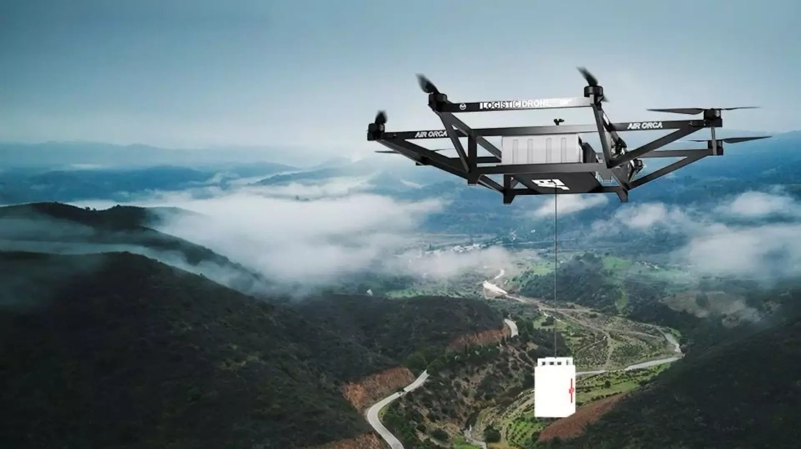 BonV Aero's Air Orca heavy-lift drone lowering a medical supply box over mountain terrain