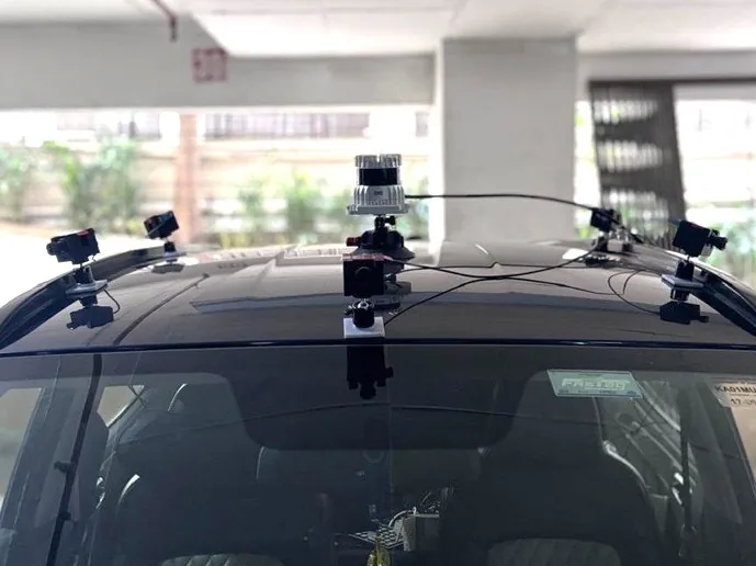 CaliperAI's roof-mounted sensor rig with LiDAR and cameras