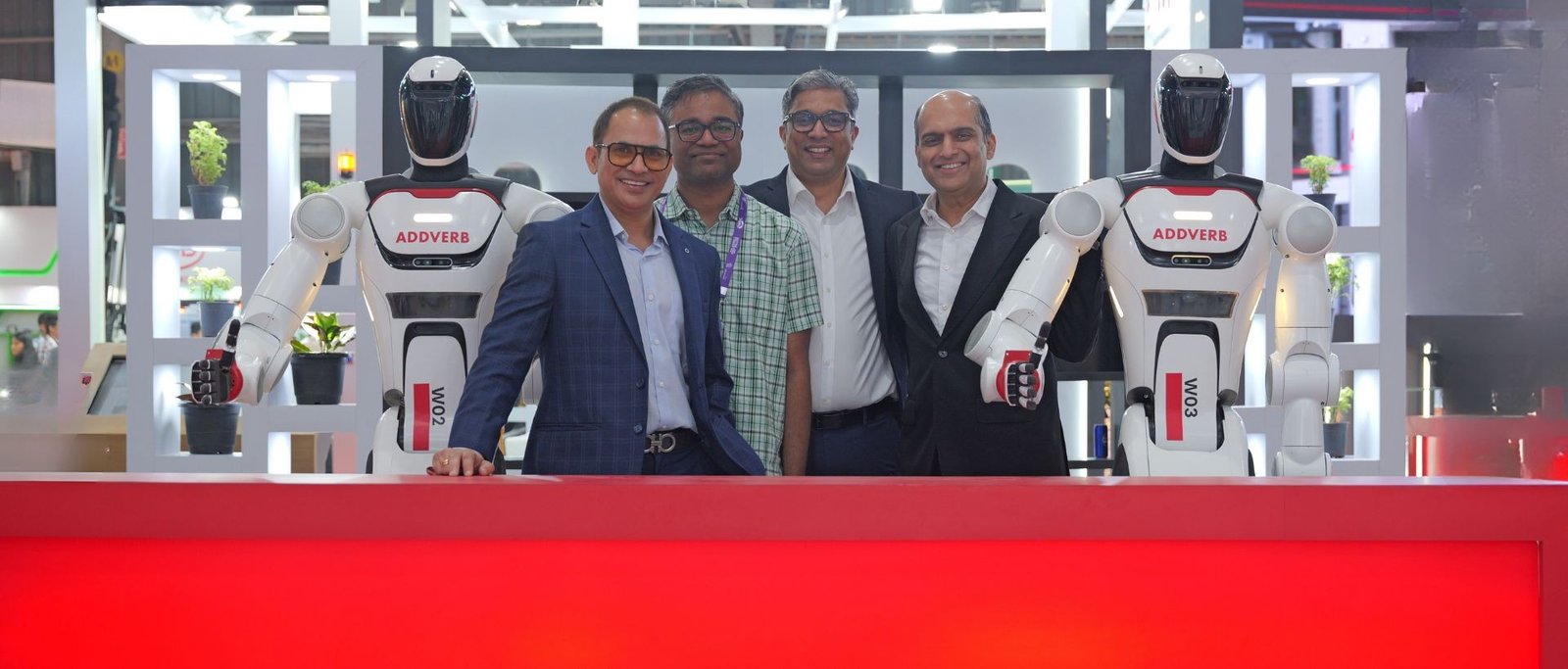 Two Addverb Elixis-W humanoids at the LogiMAT India 2026 launch