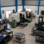 CNC machines and finished parts on a machining shop floor in Frigate's partner network