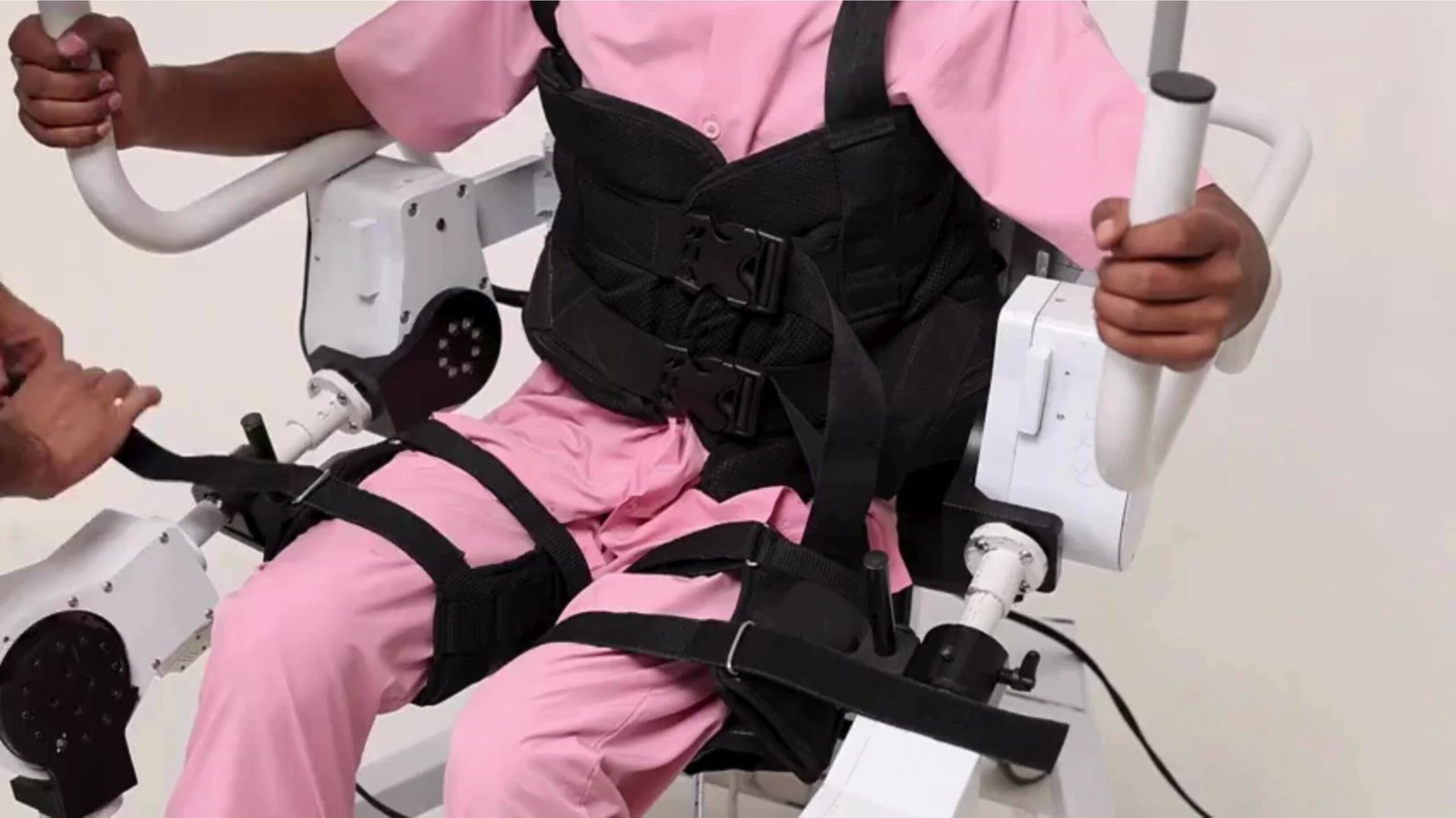 A patient using the GenElek exoskeleton gait trainer