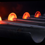 GNA Axles hot-forged rear axle shafts glowing in the forge