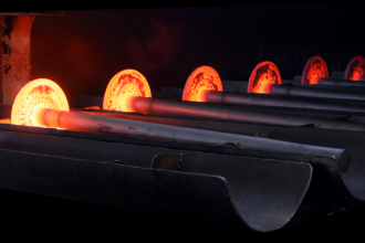 GNA Axles hot-forged rear axle shafts glowing in the forge