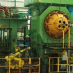 M M Forgings forge shop with large green forging presses