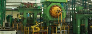 M M Forgings forge shop with large green forging presses