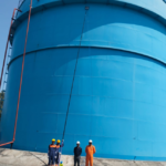 Octobotics ReachMaster telescopic inspection system on a blue storage tank