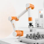 Integra Robotics P5-R900 collaborative robot arm handling metal components