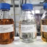 PolyCycl PolyGreenOil bottles refined from low-grade waste plastics