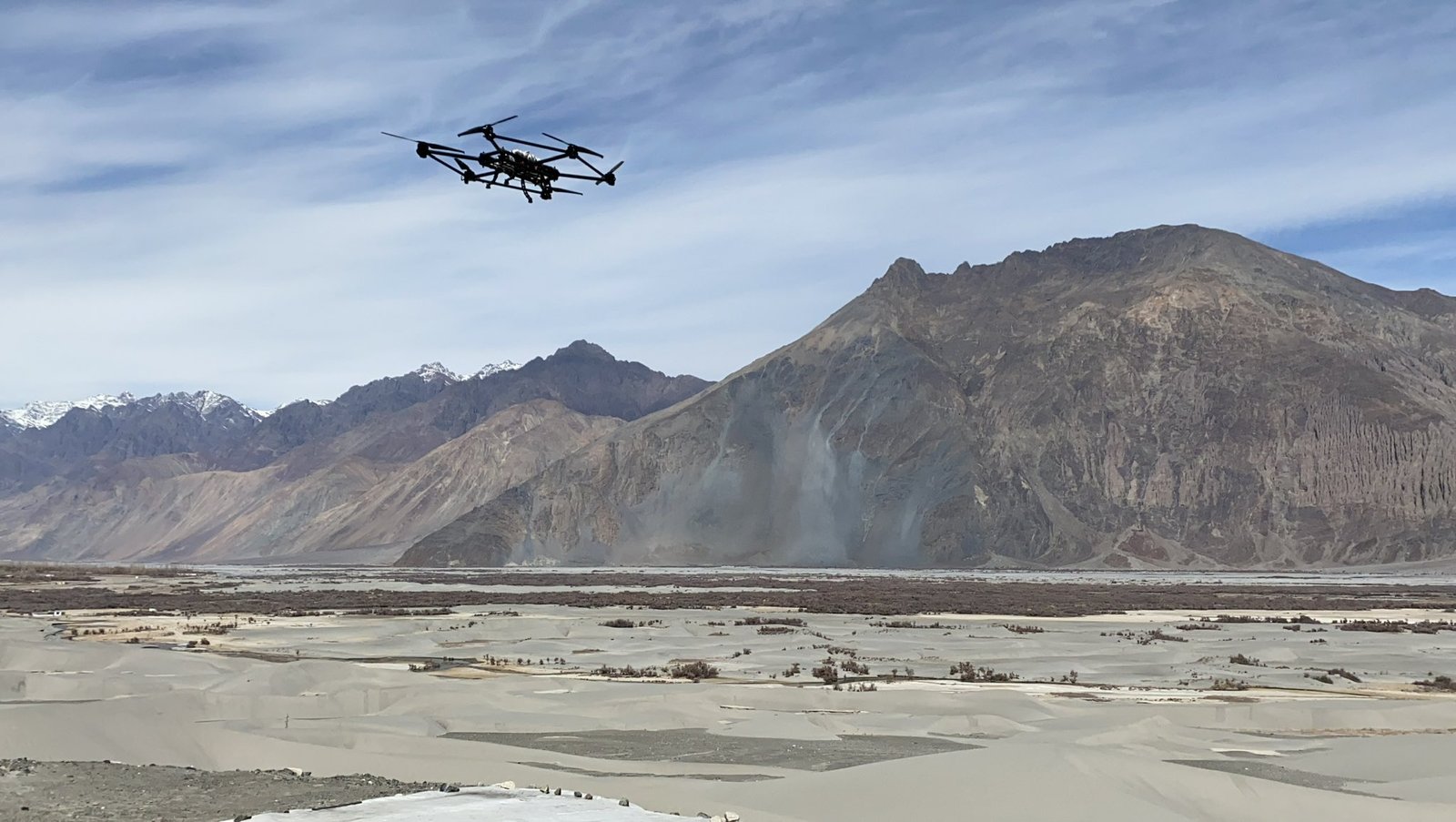 A Raphe mPhibr drone flying over high-altitude terrain