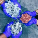 Hands holding recovered battery materials at Metastable Materials