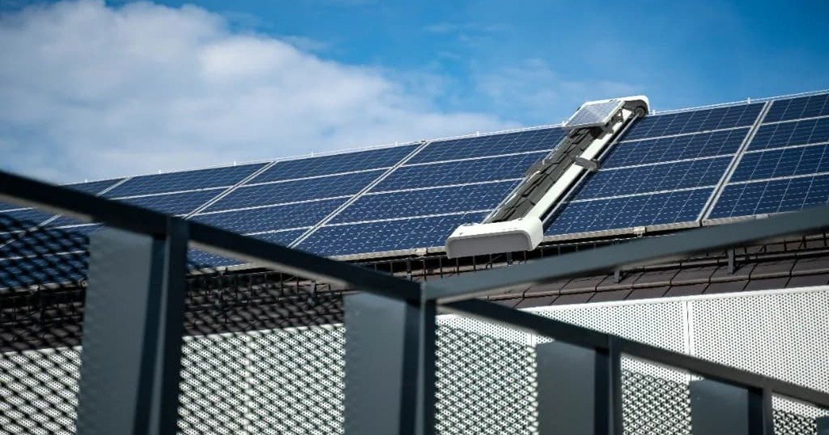 Taypro GLYDE autonomous waterless solar panel cleaning robot on a rooftop array