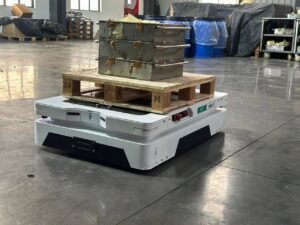 Tensrai autonomous mobile robot carrying a pallet in a warehouse