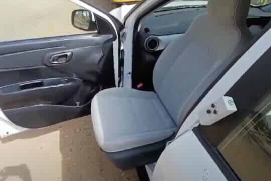 TurnPlus electric swivel seat rotated 90 degrees outward from a car door - official product photo from TRUE Assistive Technology