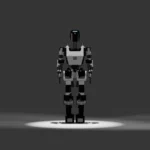 Alt text: Vanar Generation 1 humanoid robot standing front view in a studio spotlight