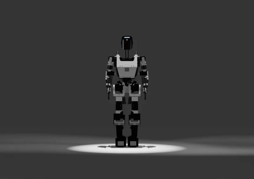 Alt text: Vanar Generation 1 humanoid robot standing front view in a studio spotlight