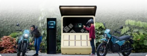 Two Zeno Emara electric motorcycles at a Zeno battery-swap station