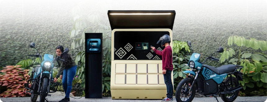 Two Zeno Emara electric motorcycles at a Zeno battery-swap station