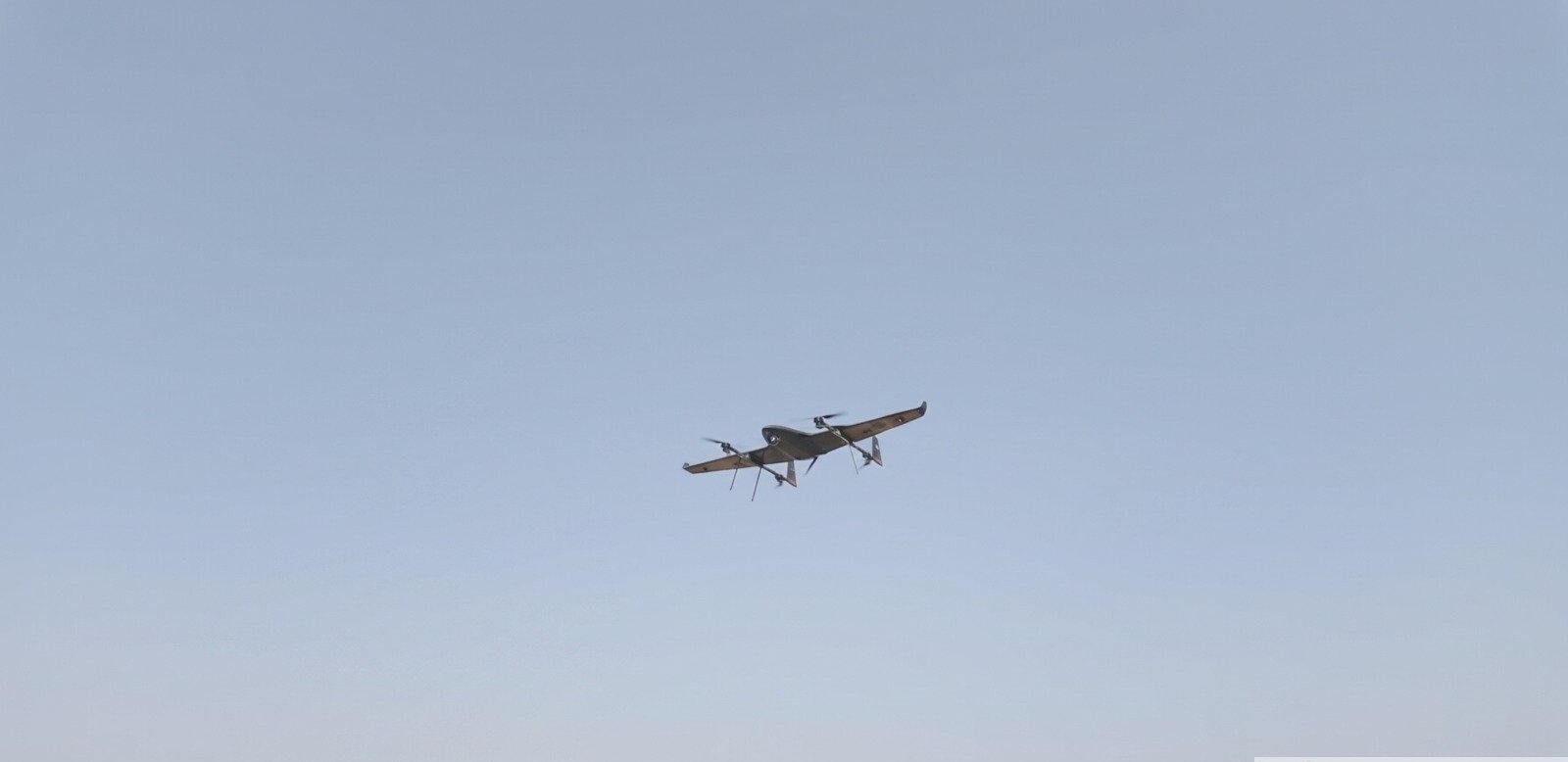Alt text: ideaForge ZOLT tactical UAV in flight, side view